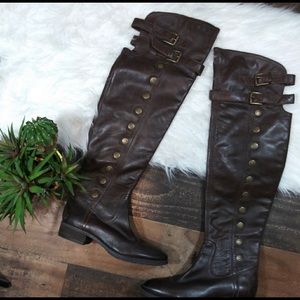 Thigh high leather brown boots with gold detailing